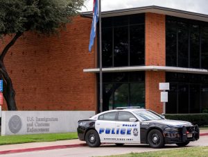 Law enforcement personnel respond at the scene of a shooting at an Immigration and Customs Enforcement (ICE) field office in Dallas, Texas, U.S., September 24, 2025.    REUTERS/Jeffrey McWhorter