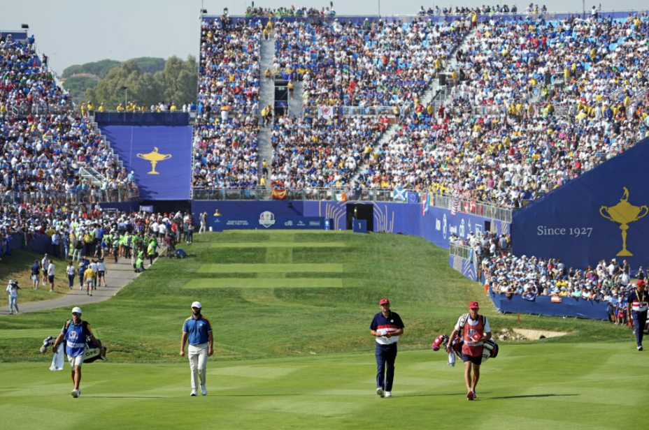 Jon Rahm (Europe) and Scottie Scheffler (USA) walk down the fairway (Bleacher Nation)