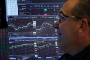 A trader works on the floor at the New York Stock Exchange (NYSE) in New York City, U.S., October 29, 2025. REUTERS/Brendan McDermid