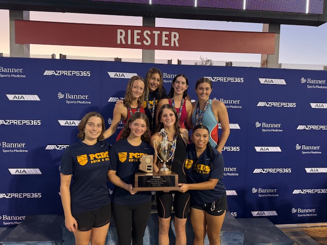 Girls' Swim & Dive Celebrates Victory