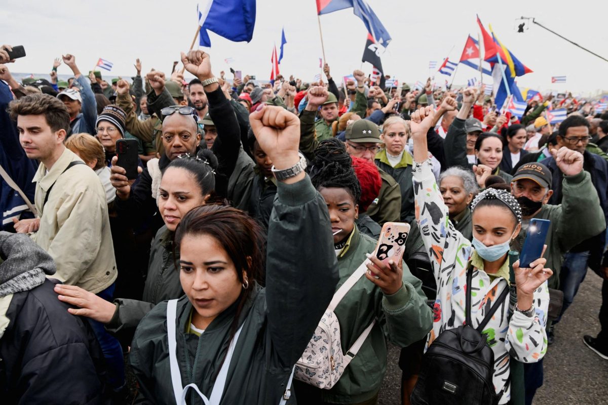 People raise their fists during a march outside the U.S. Embassy to protest against what they denounce as U.S. aggression in the region, following the capture of Venezuelan leader Nicolas Maduro and his wife, Cilia Flores, and the killing of Cuban soldiers in the U.S. strike, in Havana, Cuba, January 16, 2026. REUTERS/Norlys Perez