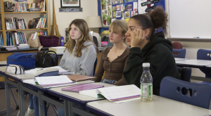 Mandarin students learn a new grammar concept (From left: Marin Weiland, Addie Ward, Jaylyn Taylor)