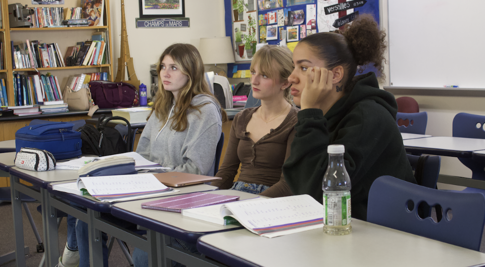 Mandarin students learn a new grammar concept (From left: Marin Weiland, Addie Ward, Jaylyn Taylor)
