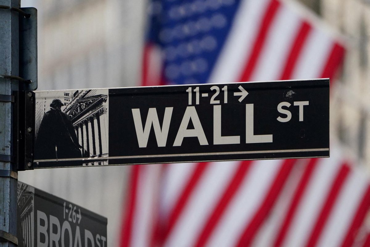 The Wall Street sign is pictured at the New York Stock Exchange (NYSE) in the Manhattan borough of New York City, New York, U.S., March 9, 2020. REUTERS/Carlo Allegri