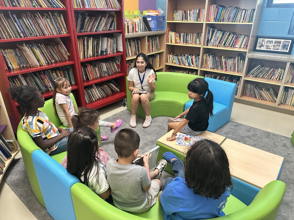 Tara Ghafouri reads her book "What’s In Your Lunchbox?" at St. Vincent DePaul