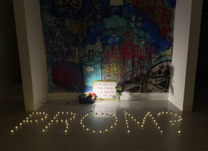 Carson Rose Promposes with a Bruno Mars themed poster and candles