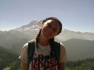 Mary Bartolino At the Northwest Youth Corp Camp in front of Mt. Rainier